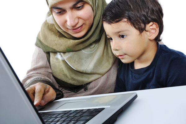 Muslim-woman-and-her-son-on-laptop